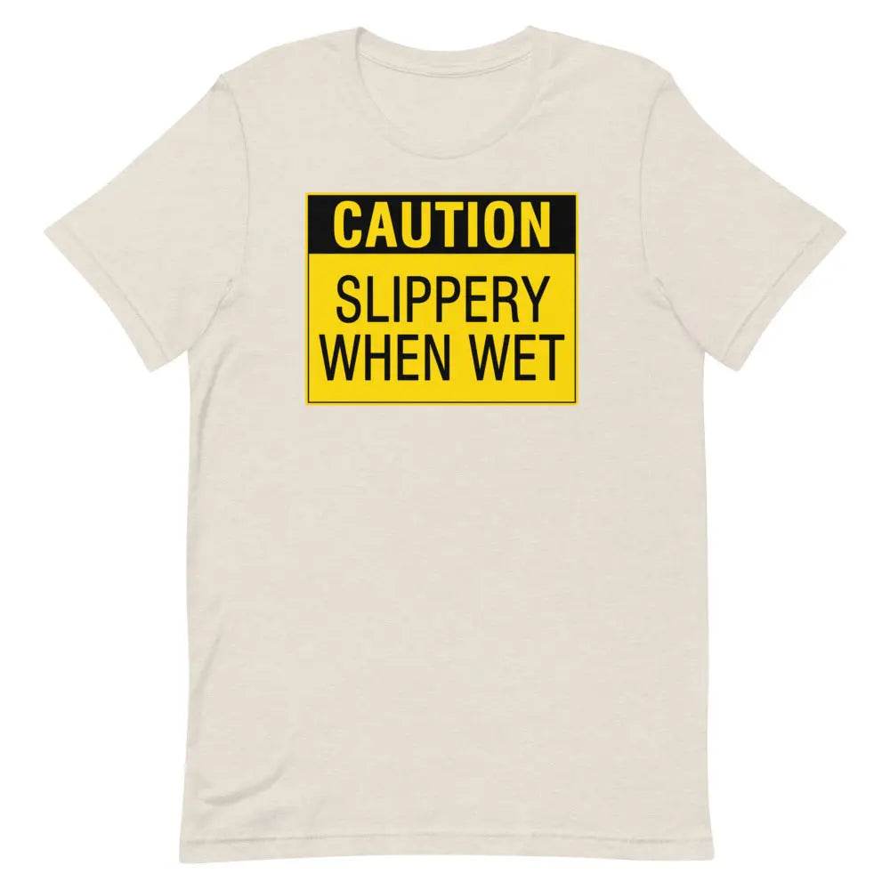 Caution: Slippery When Wet T-Shirt – Funny Graphic Tee for Men & Women